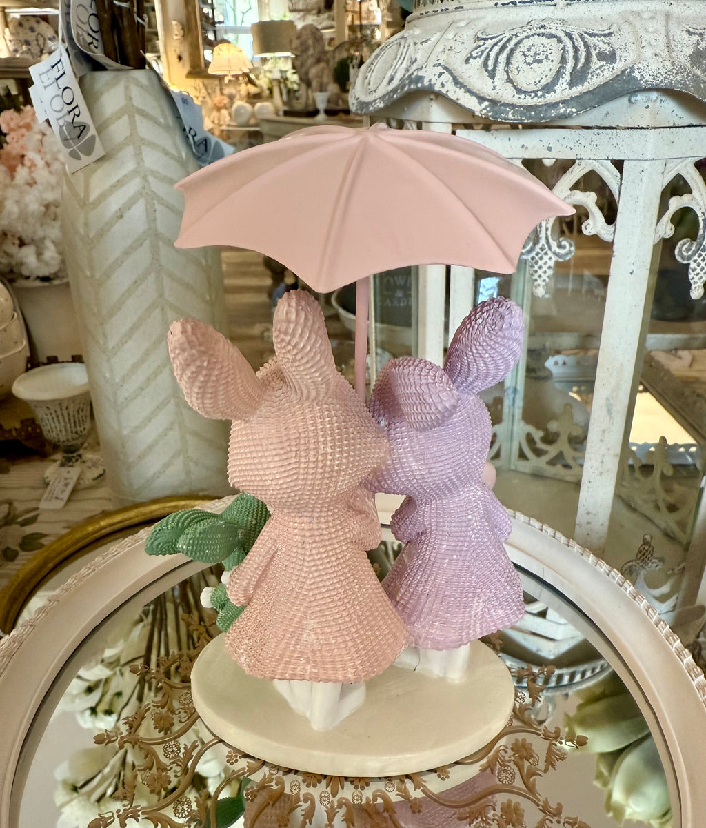 Famille Lapin sous la Pluie