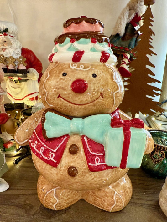 Bonbonnière en faïence représentant un bonhomme pain d’épices de 25 cm, aux couleurs rouge, marron et vert menthe, style décoration féérique et gourmande de Noël.