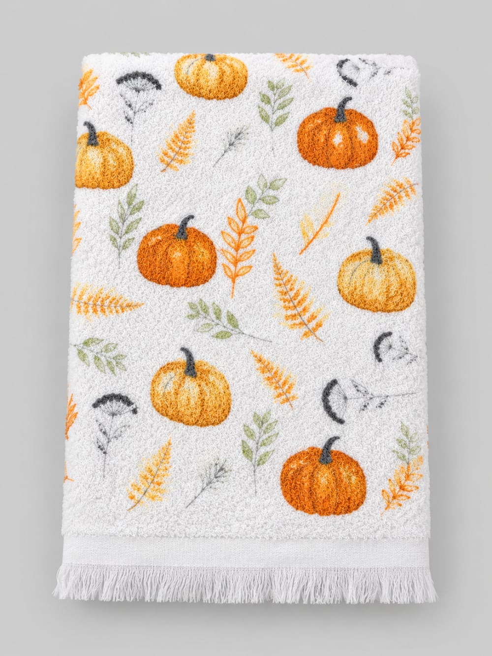 Essuie-mains blanc à motifs de potirons orange et feuillages verts, style campagne automnale pour décoration de cuisine