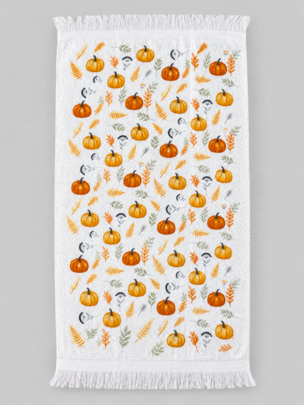 Essuie-mains blanc à motifs de potirons orange et feuillages verts, style campagne automnale pour décoration de cuisine
