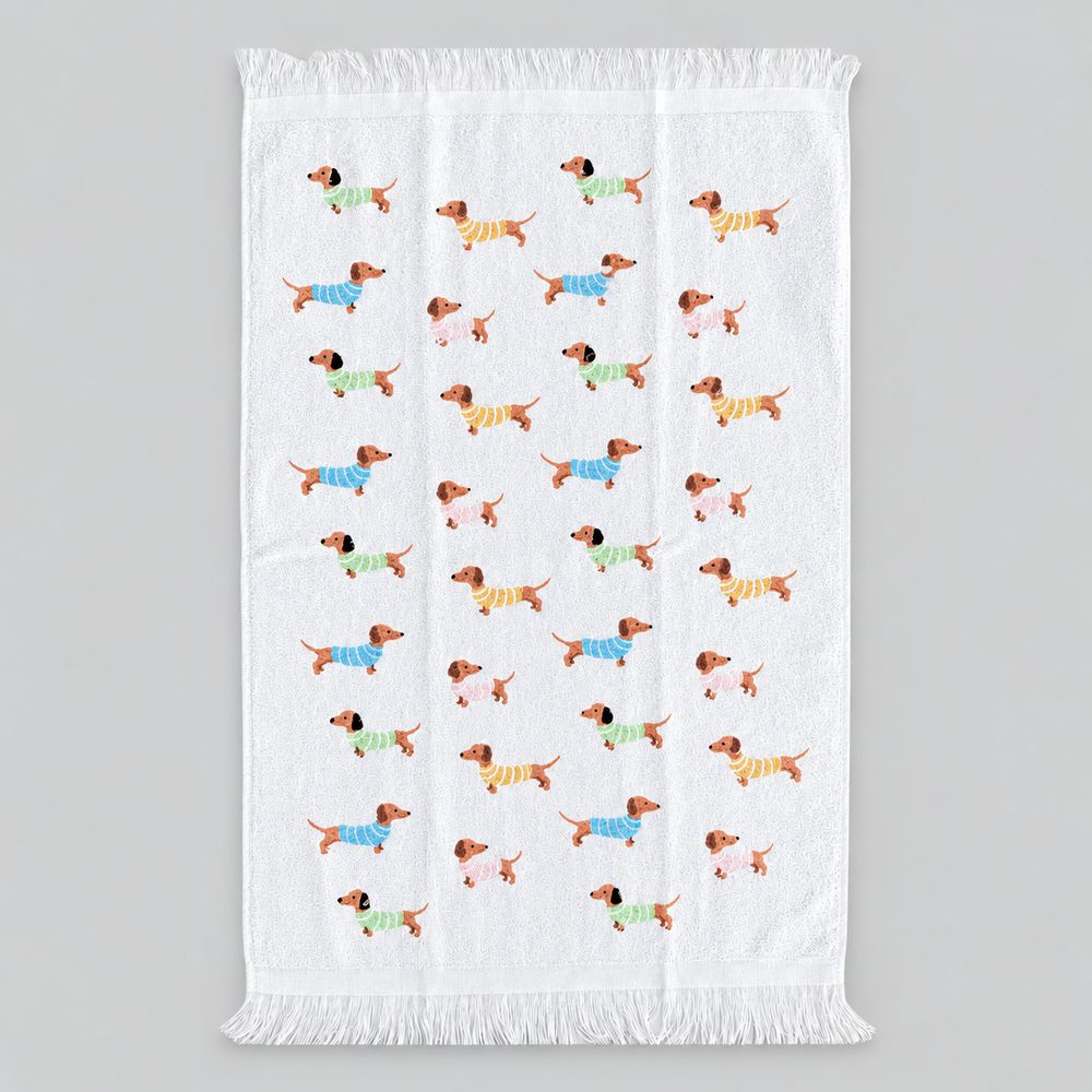 Essuie-mains Teckels Malicieux déplié, motifs de teckels colorés et franges, 40 × 66 cm.