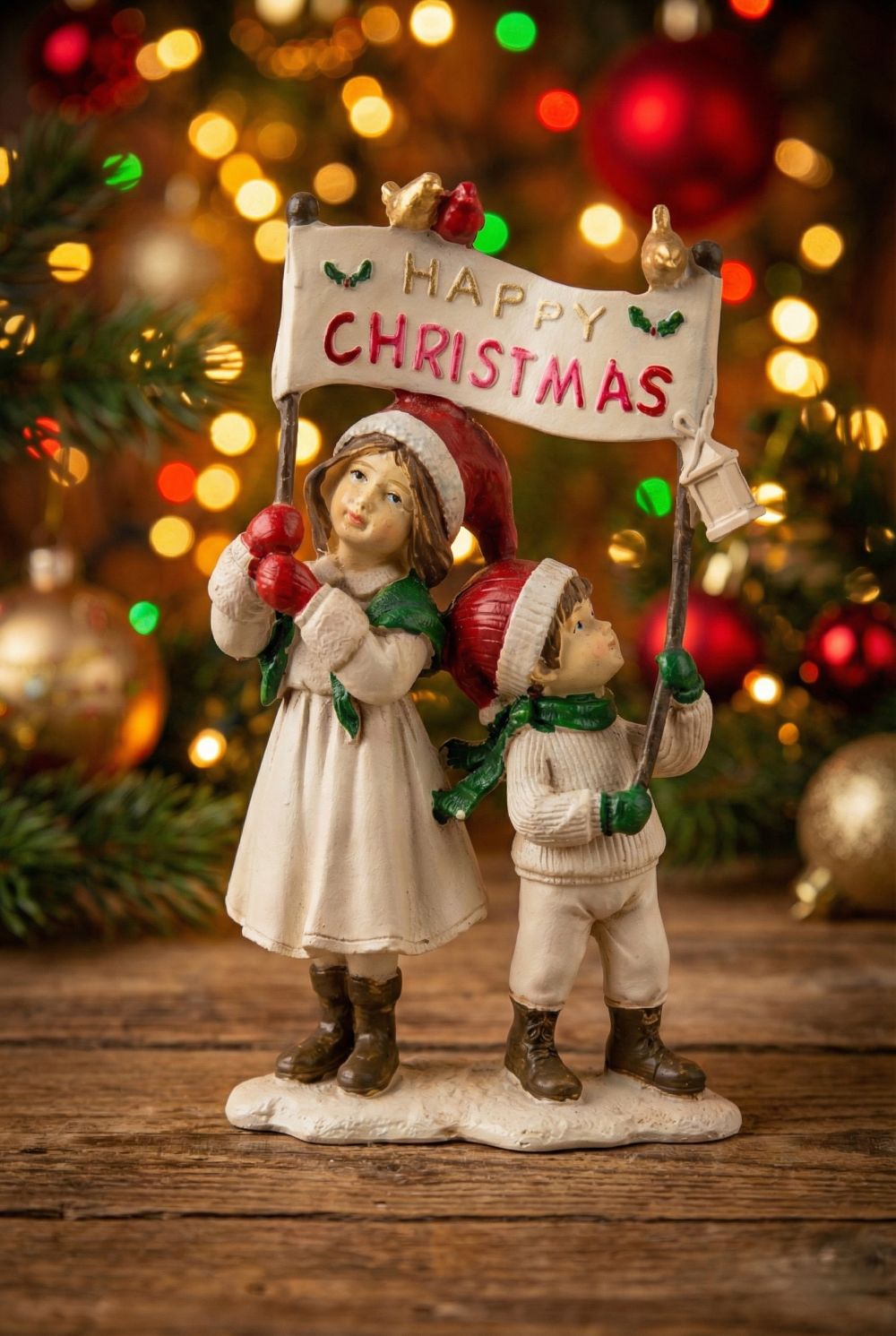 Figurine décorative de Noël représentant des enfants avec inscription Happy Christmas, tons doux et festifs, décoration de charme pour ambiance féérique hivernale