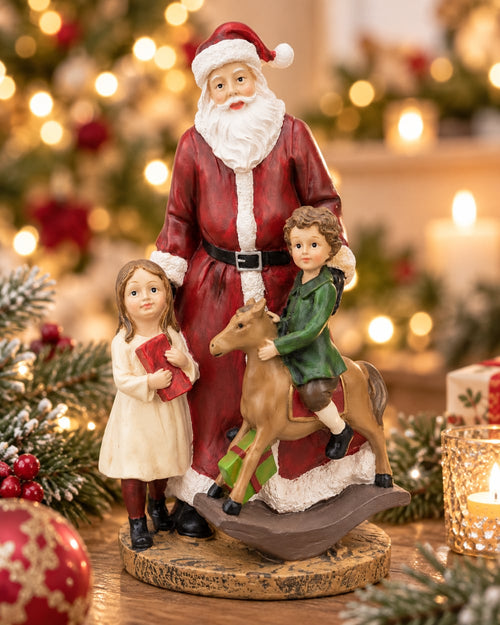 Figurine décorative de Noël représentant un Père Noël avec deux enfants, couleurs rouge blanc et vert, style romantique et féérique, hauteur 20 cm