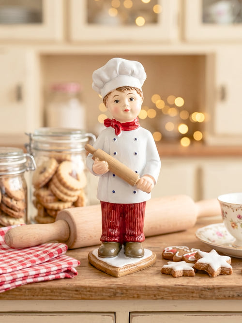 Figurine Petit Cuisinier de Noël blanc et rouge tenant un rouleau à pâtisserie, décoration rétro et gourmande pour la cuisine