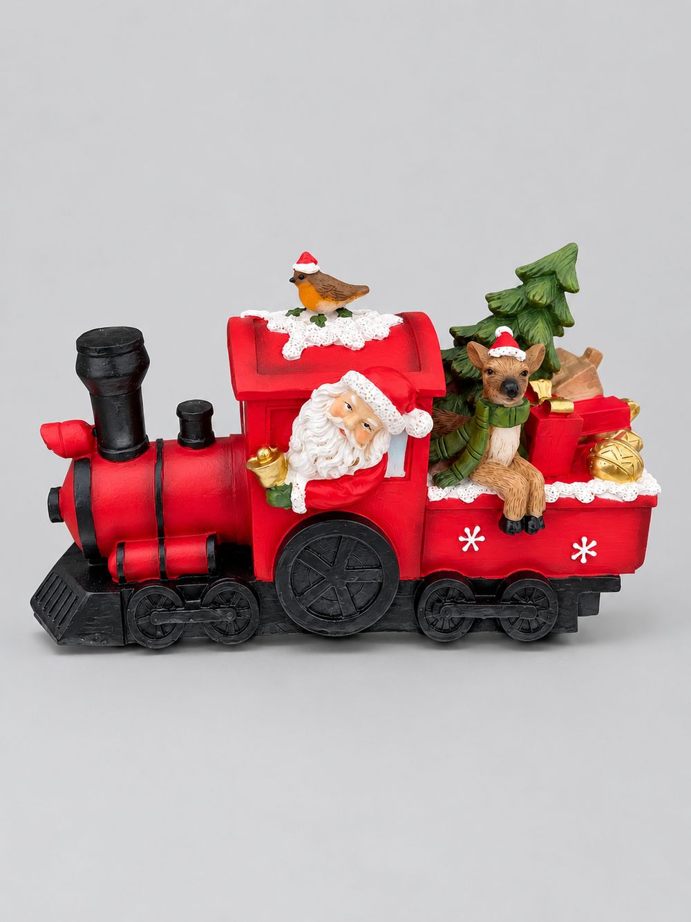 Locomotive de Noël rouge avec Père Noël, renne et petit oiseau, présentée sur fond gris clair.