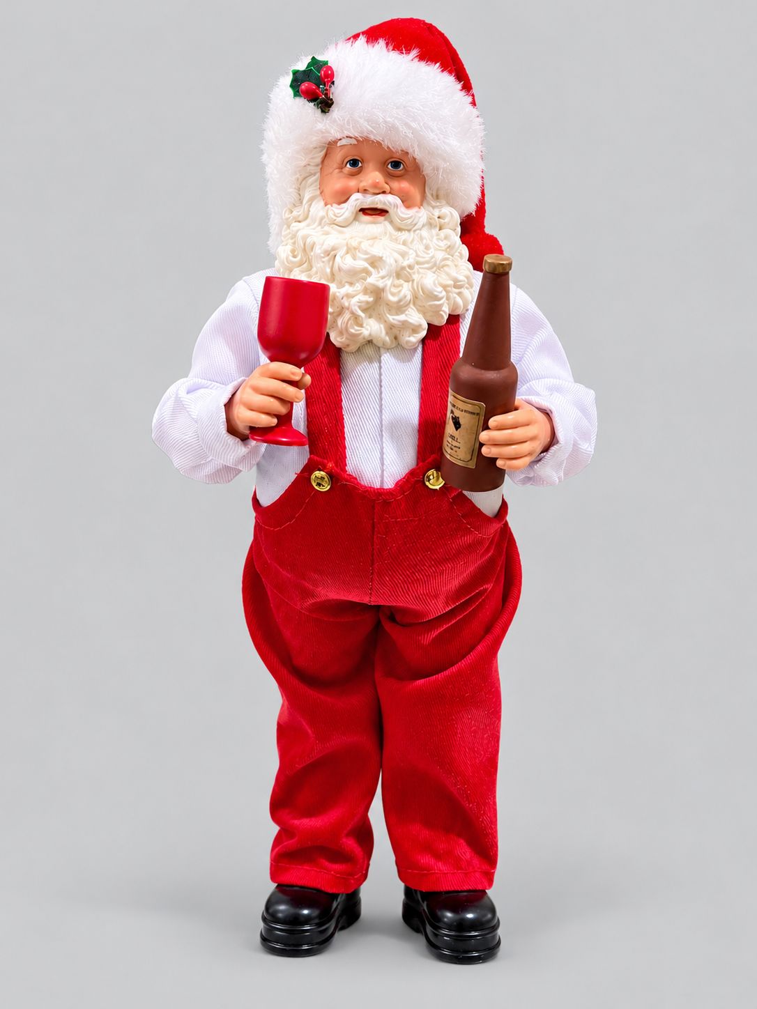 Figurine Père Noël Esprit des Vignes de 28 cm, tenant un verre rouge et une bouteille, sur fond gris clair.