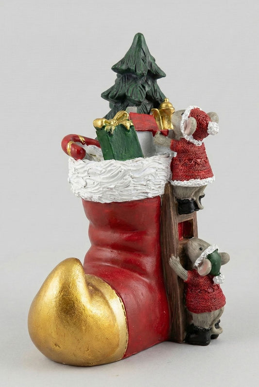 Figurine de Noël représentant des souris dans un soulier lumineux rouge, vert et doré, décoration féérique et poétique pour ambiance chaleureuse de fêtes